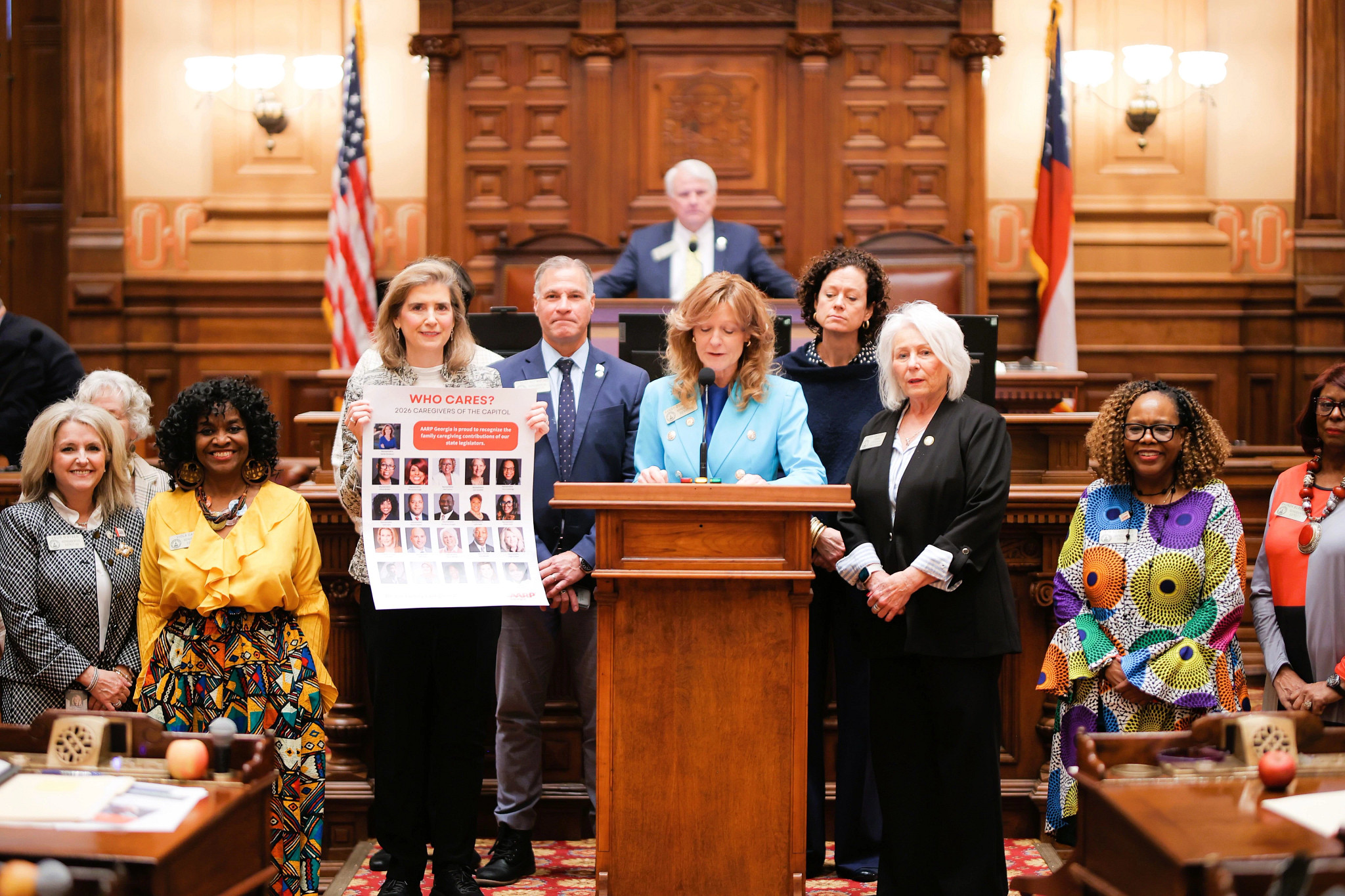 Georgia lawmakers and a a r p representatives at the State Capitol recognizing family caregivers