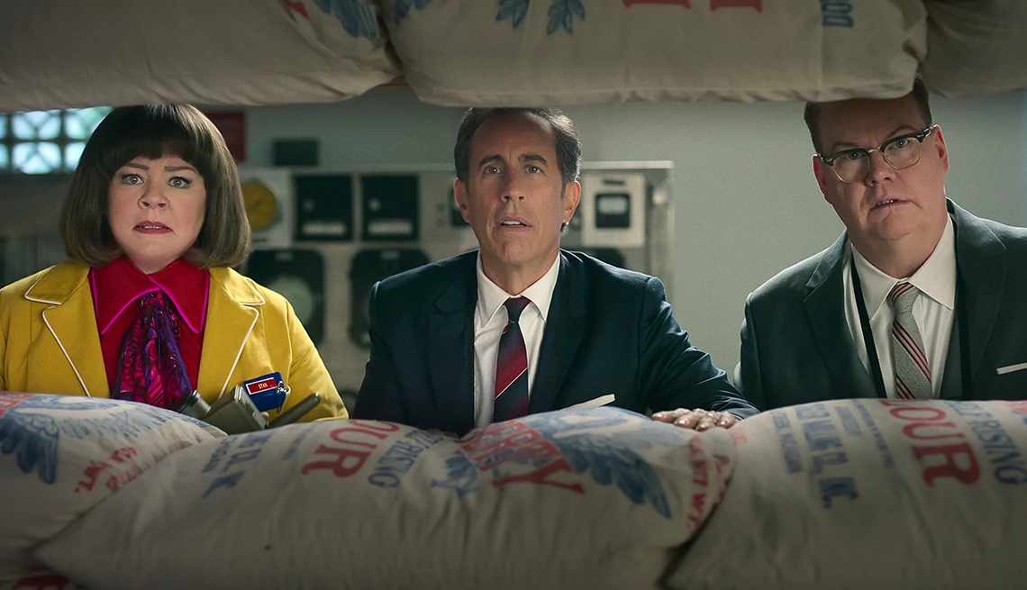 Melissa McCarthy, Jerry Seinfeld and Jim Gaffigan looking at bag of flours in Unfrosted