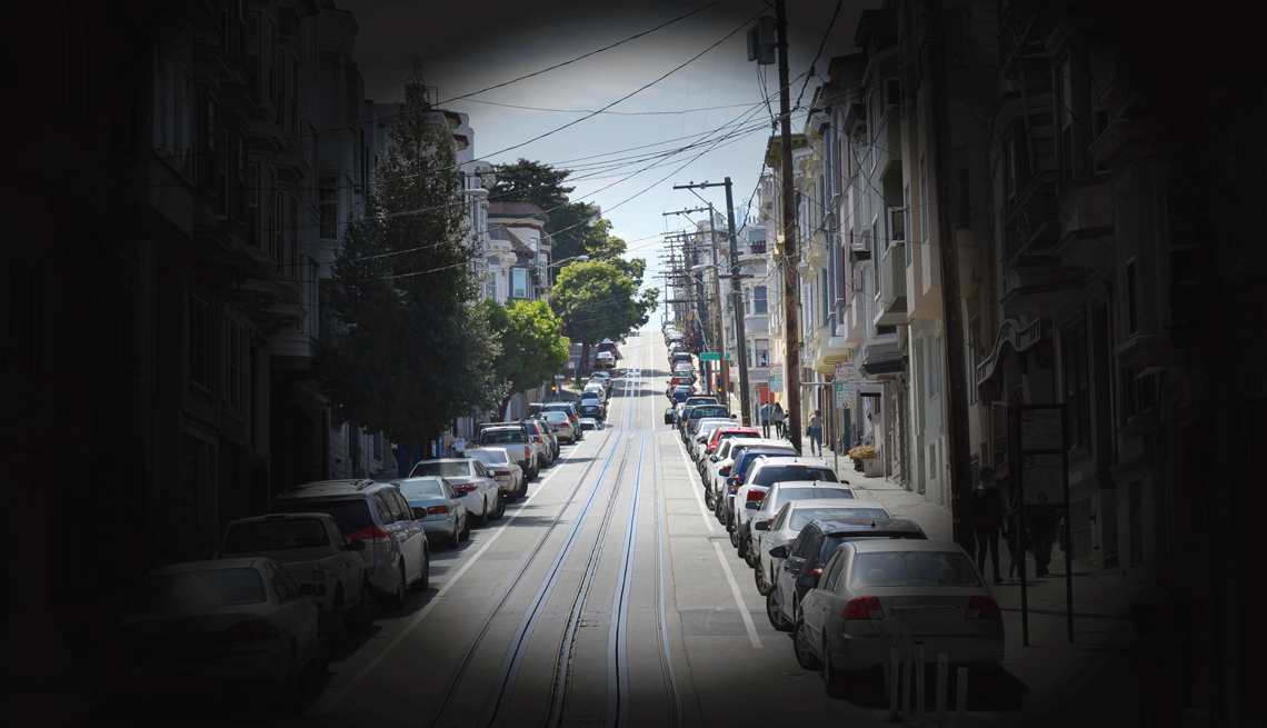Tunnel vision impacts your peripheral vision. image of a street as if you are looking through a tunnel