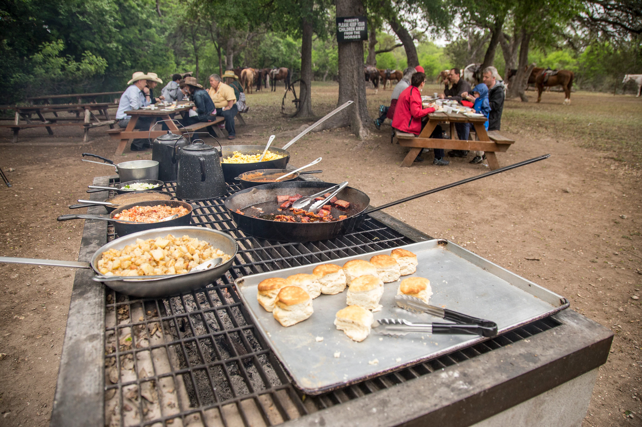 food on a grill at a campsite