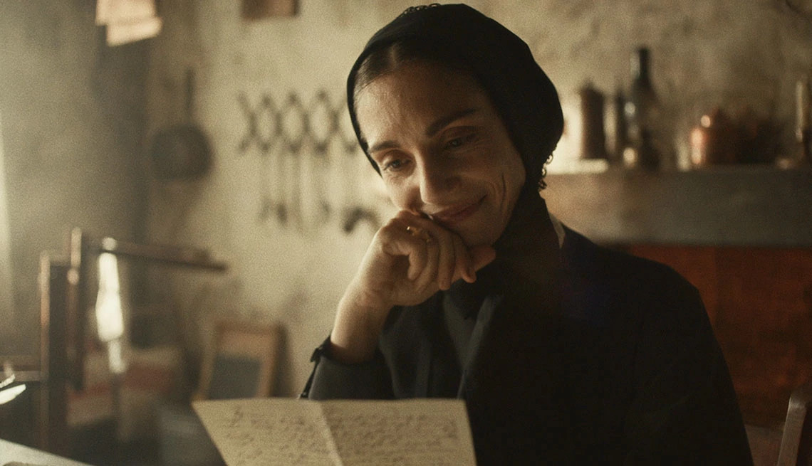 Cristiana Dell’Anna standing in front of schoolchildren in the film "Cabrini"