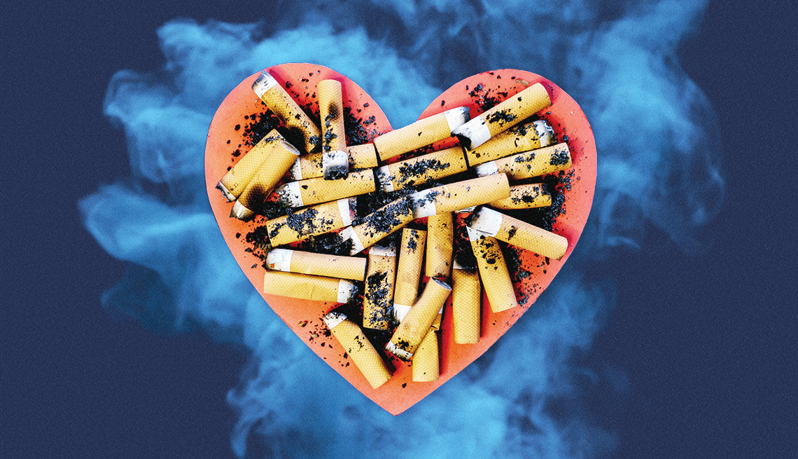 Smoking cigarette's can impact your blood pressure. cigarette butts in a heart shaped tray with smoke billowing out behind the tray