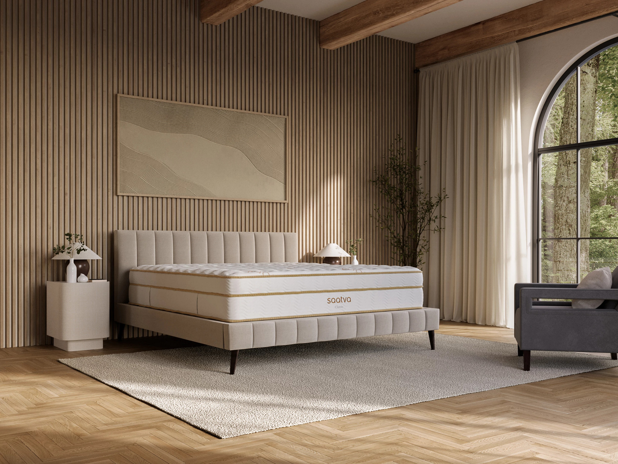 The Saatva Classic mattress in a natural wood bedroom.