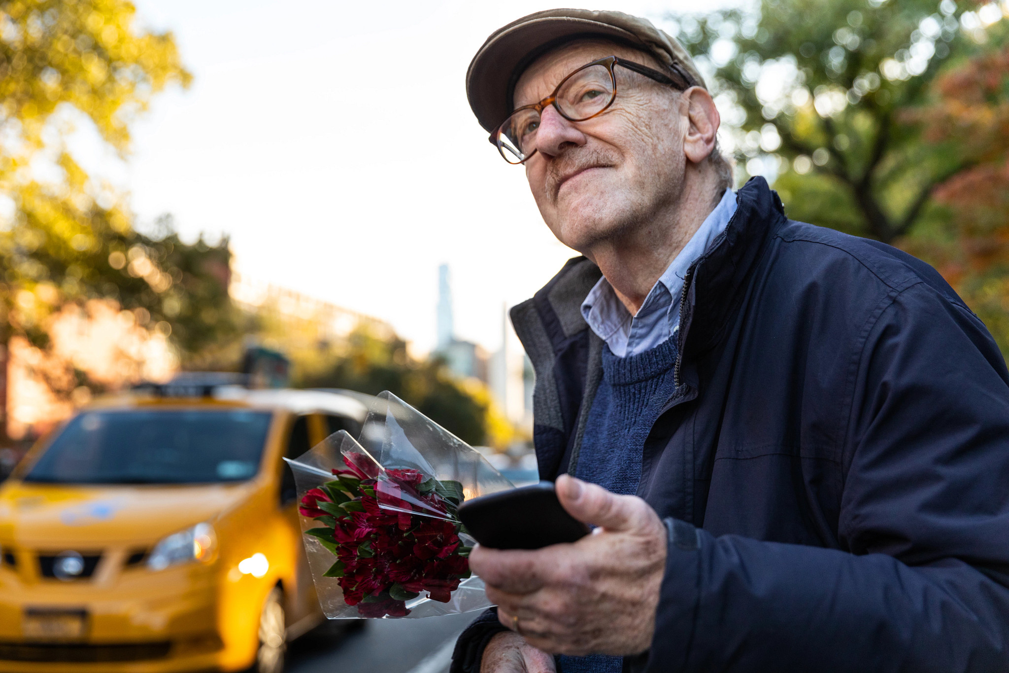 man waiting for a taxicab
