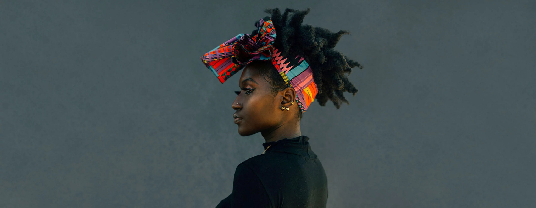 woman wearing a colorful headwrap