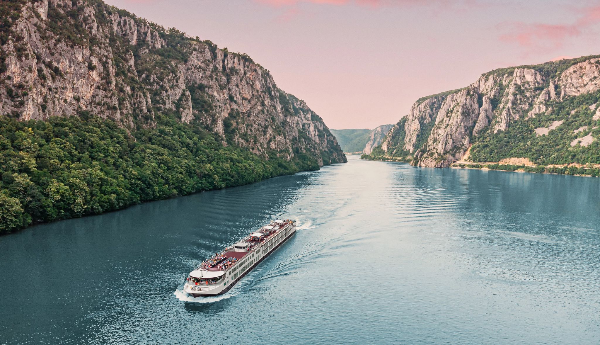 Smart Guide to River Cruises a cruise ship travling down a river