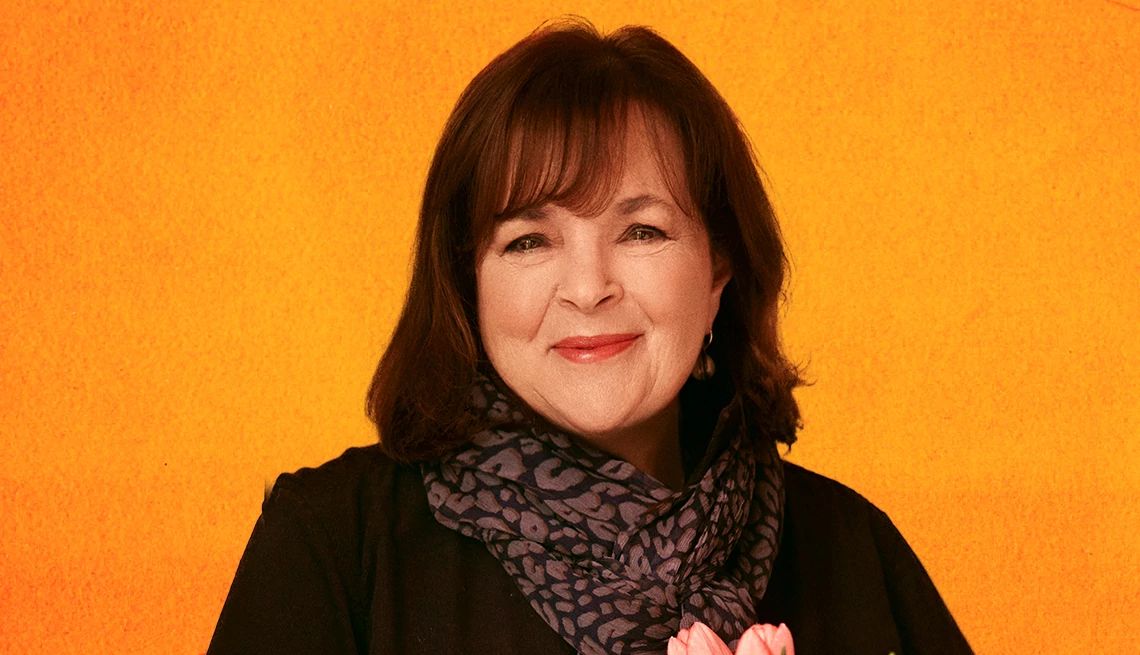 Ina Garten Talks New Memoir 'Be Ready When the Luck Happens' Ina Garten against orange background