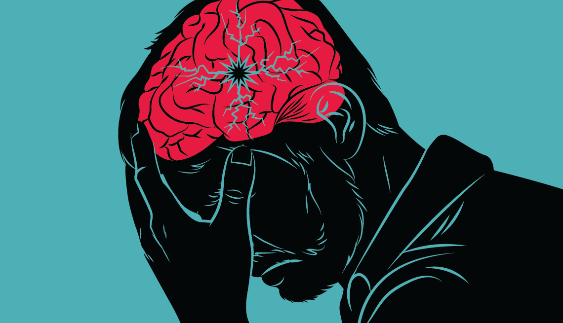 a man with his head in his hands with a crack on his brain