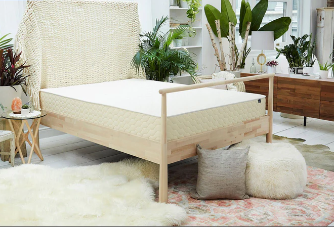 The WinkBed EcoCloud mattress in a bohemian-themed bedroom