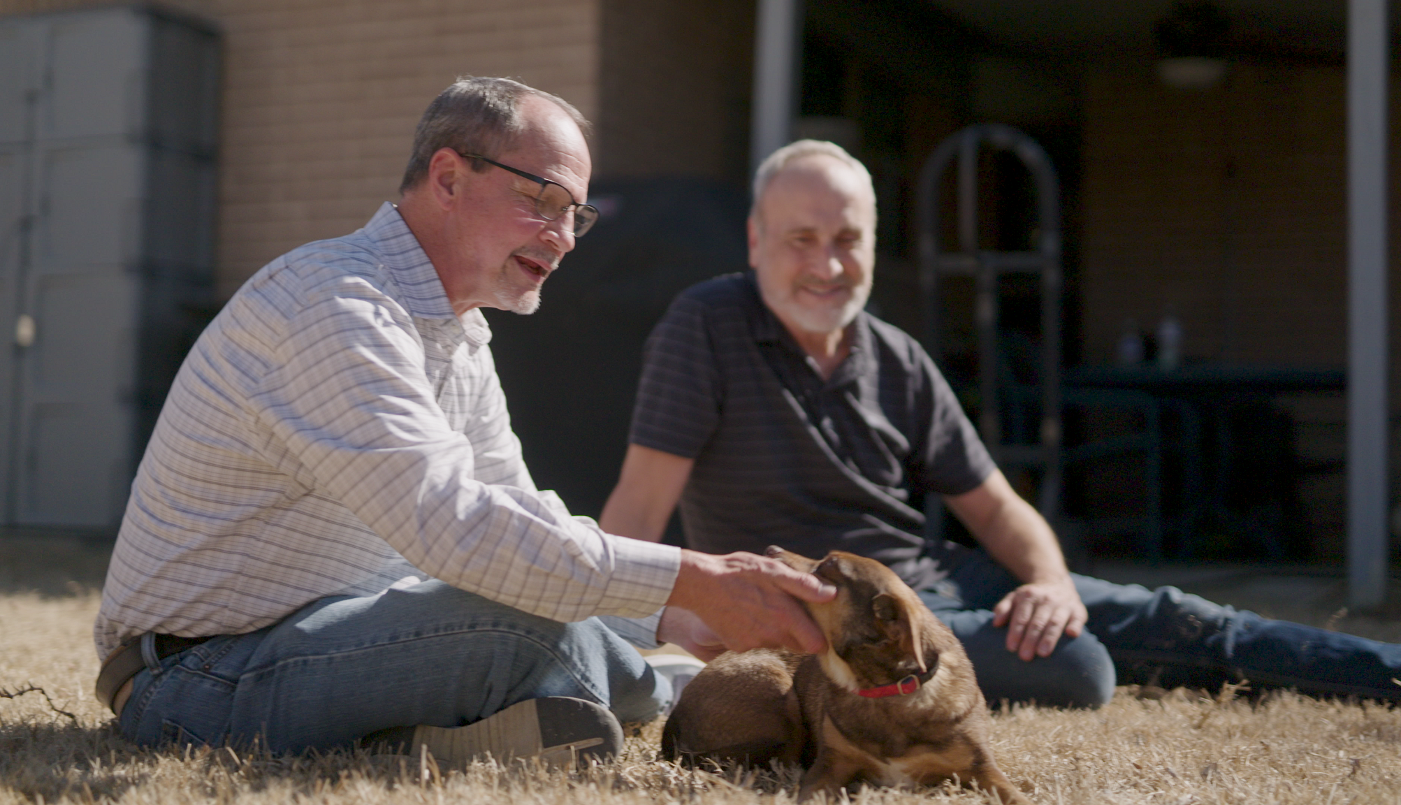 Jeffrey Woolverton plays with his dog Jeffrey Woolverton plays with his dog