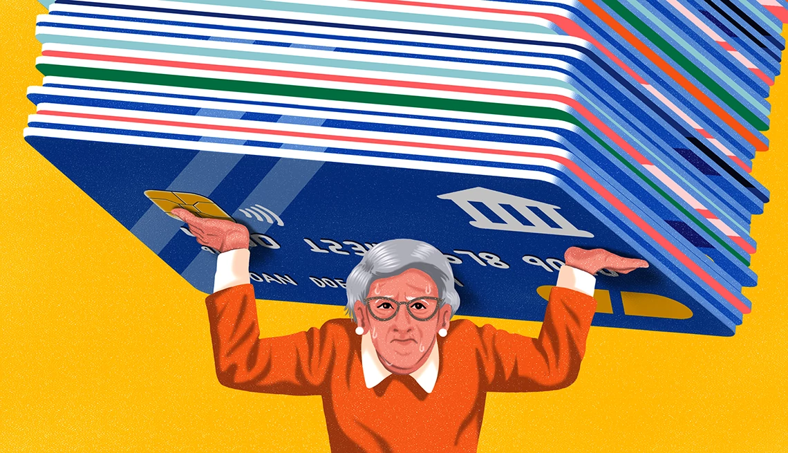 why retirees are carrying more debt a person weighed down by credit cards