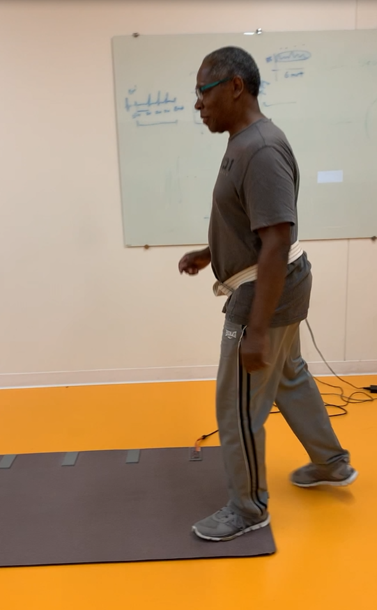 A man, Stevie Dickens, participating in a study to help his walking performance.