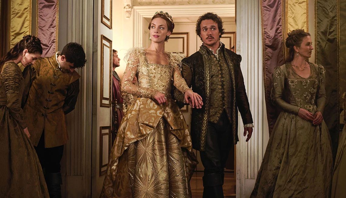 Rachel Skarsten and Ben Geurens in the CW series Reign Rachel Skarsten and Ben Geurens standing next to each in Reign
