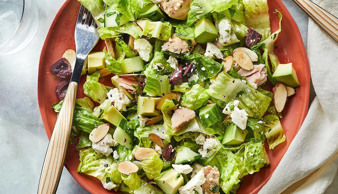 A close-up view of avocado tuna salad in a bowl
