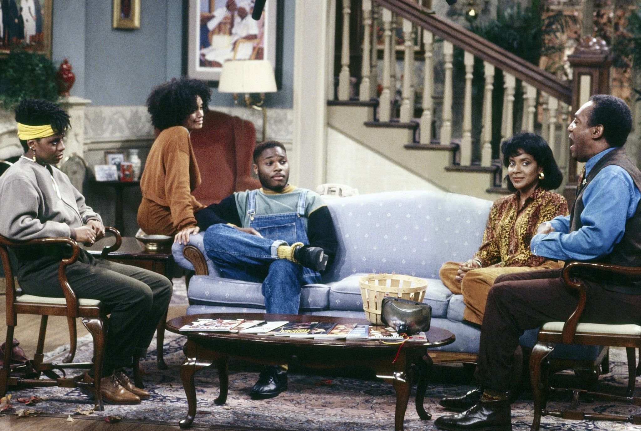 Actor Malcolm-Jamal Warner Dies at 54 the cast of The Cosby Show is show side by side: Lisa Bonet, Tempestt Bledsoe, Malcolm-Jamal Warner, Phylicia Rashad and Bill Cosby