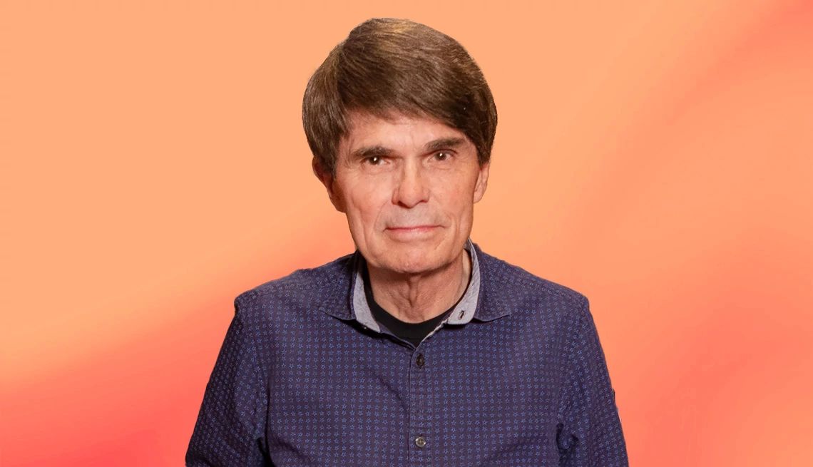 Dean Koontz interview Dean Koontz against peach colored ombre background