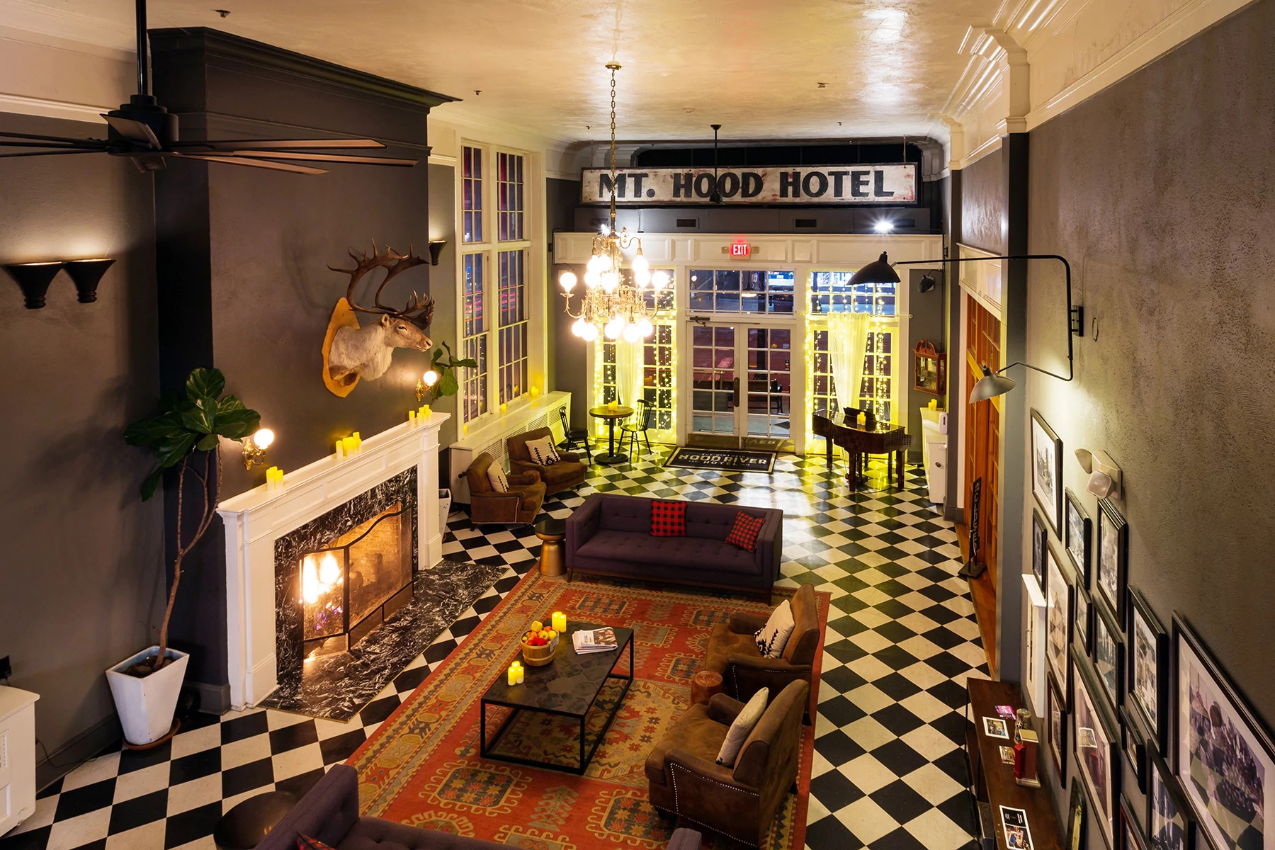 Mt. Hood hotel lobby with fireplace, checkered floors, and rustic décor for a fall getaway