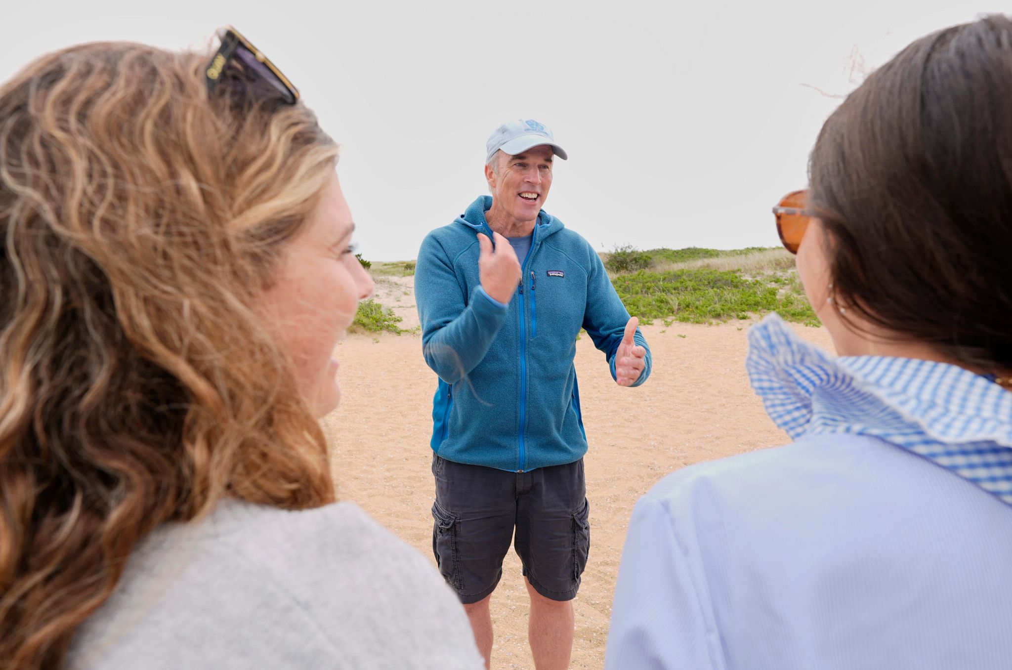 Martha’s Vineyard Swimmer A photo shows endurance swimmer Lewis Pugh chatting with visitors to Martha's Vineyard in Edgartown, Mass.