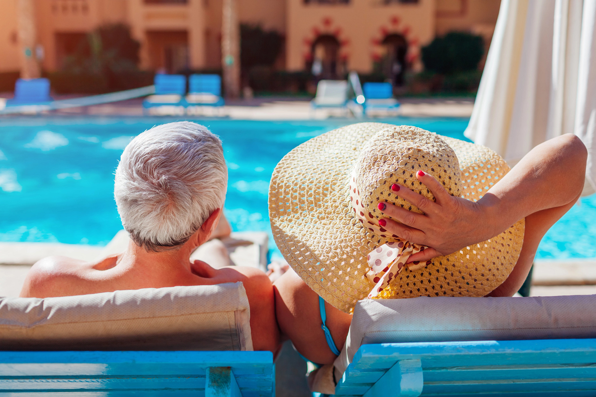 people sitting at a pool