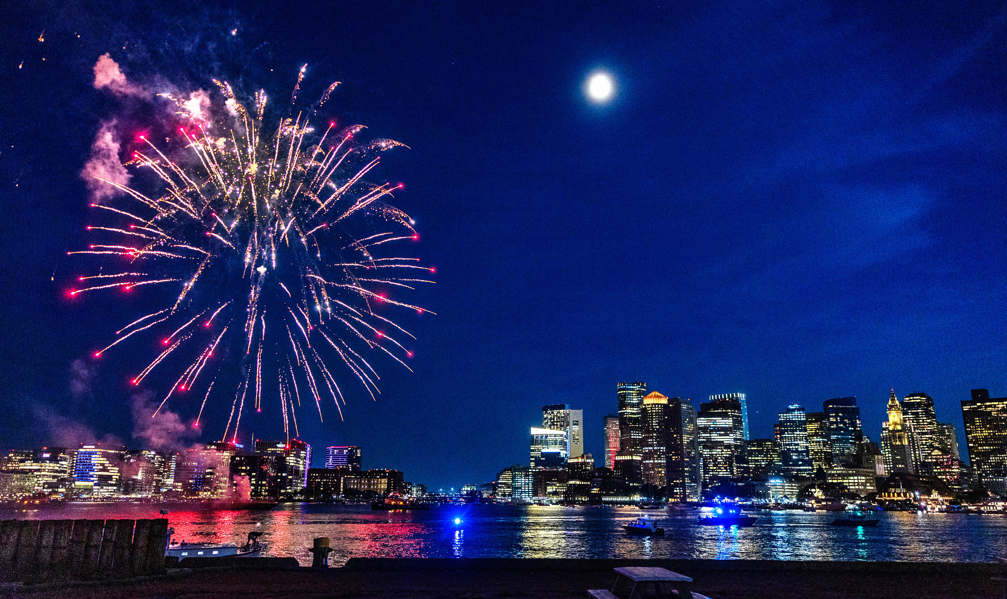 Boston Harborfest Fireworks explode over the Boston Seaport District