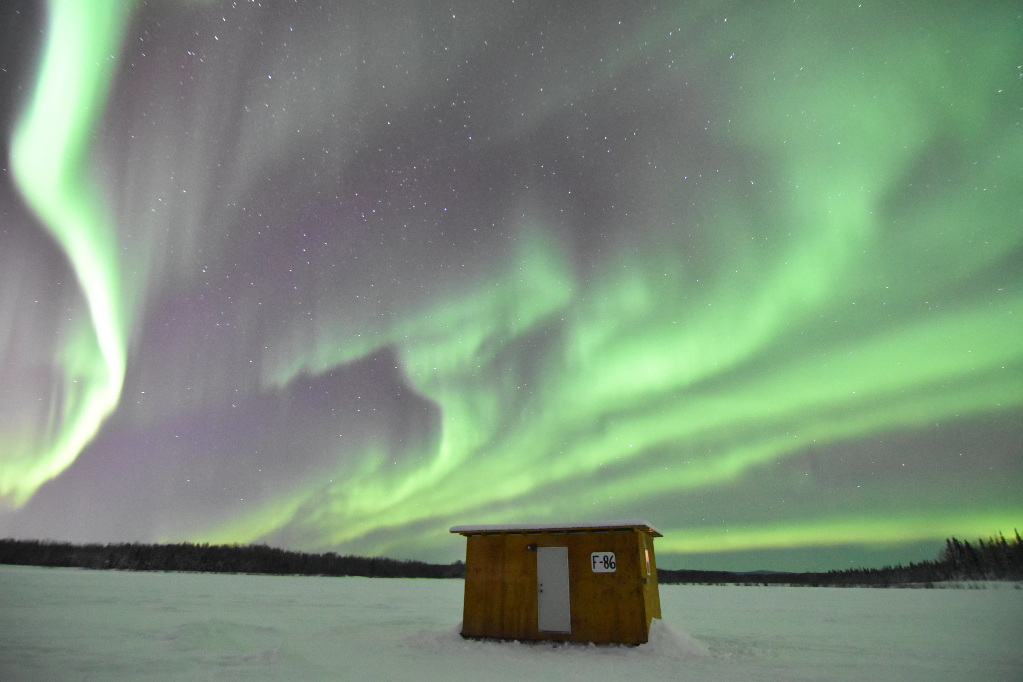 ice fishing with the northern lights