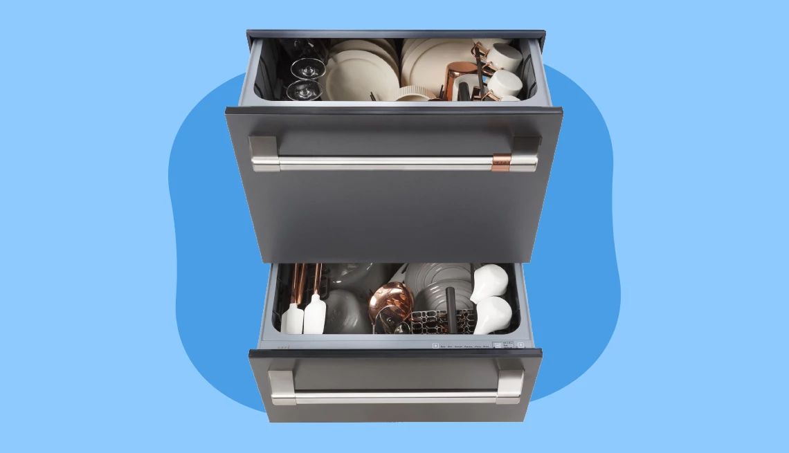 a dishwasher with both drawers open and filled with dishes