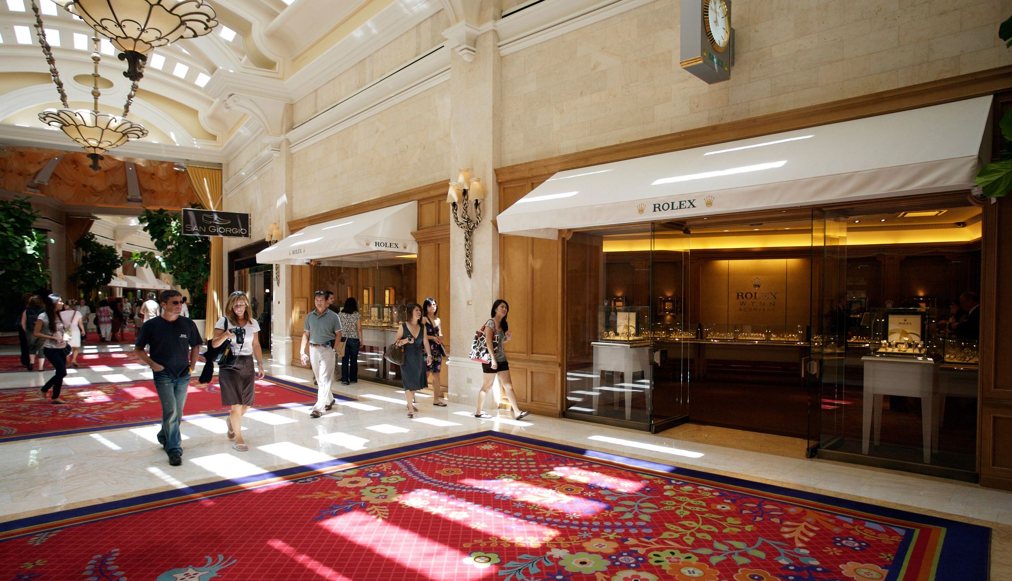Go shopping People walking outside Rolex store