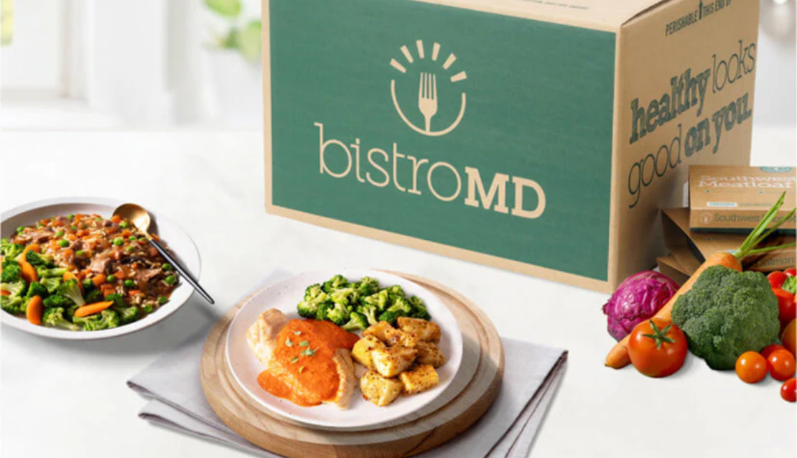 bistroMD delivery box, healthy ingredients and prepared meals sitting on a kitchen counter top