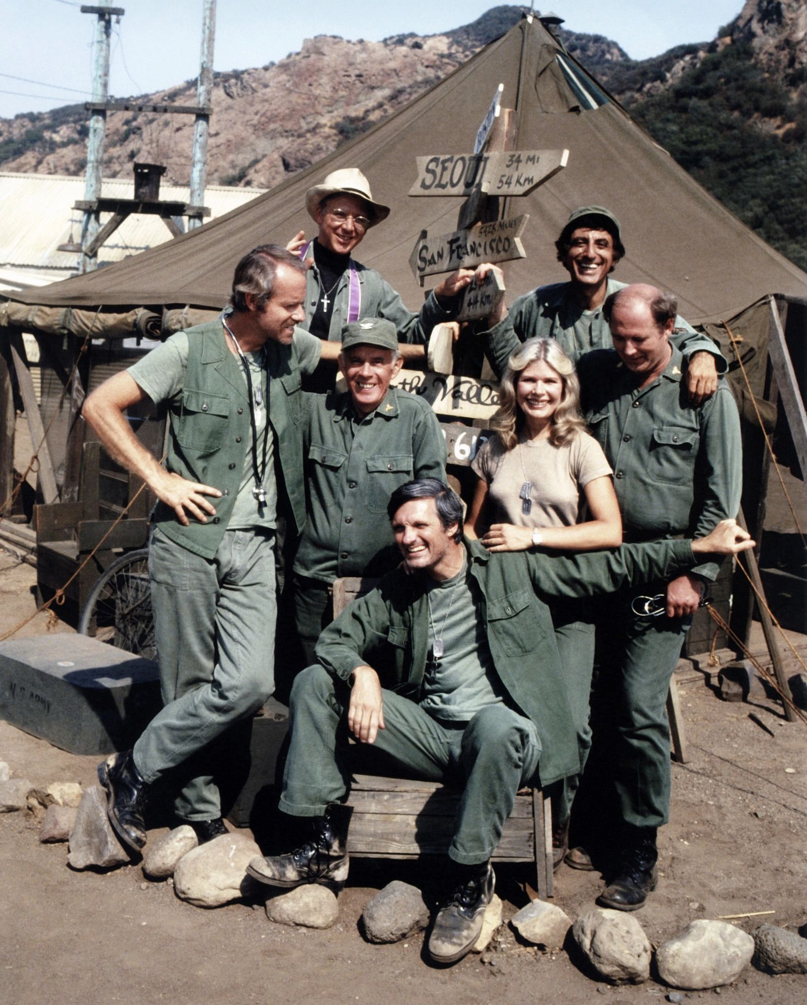 ‘M*A*S*H’ Star Loretta Swit Dies at 87 the cast of MASH posing on set for a group photo