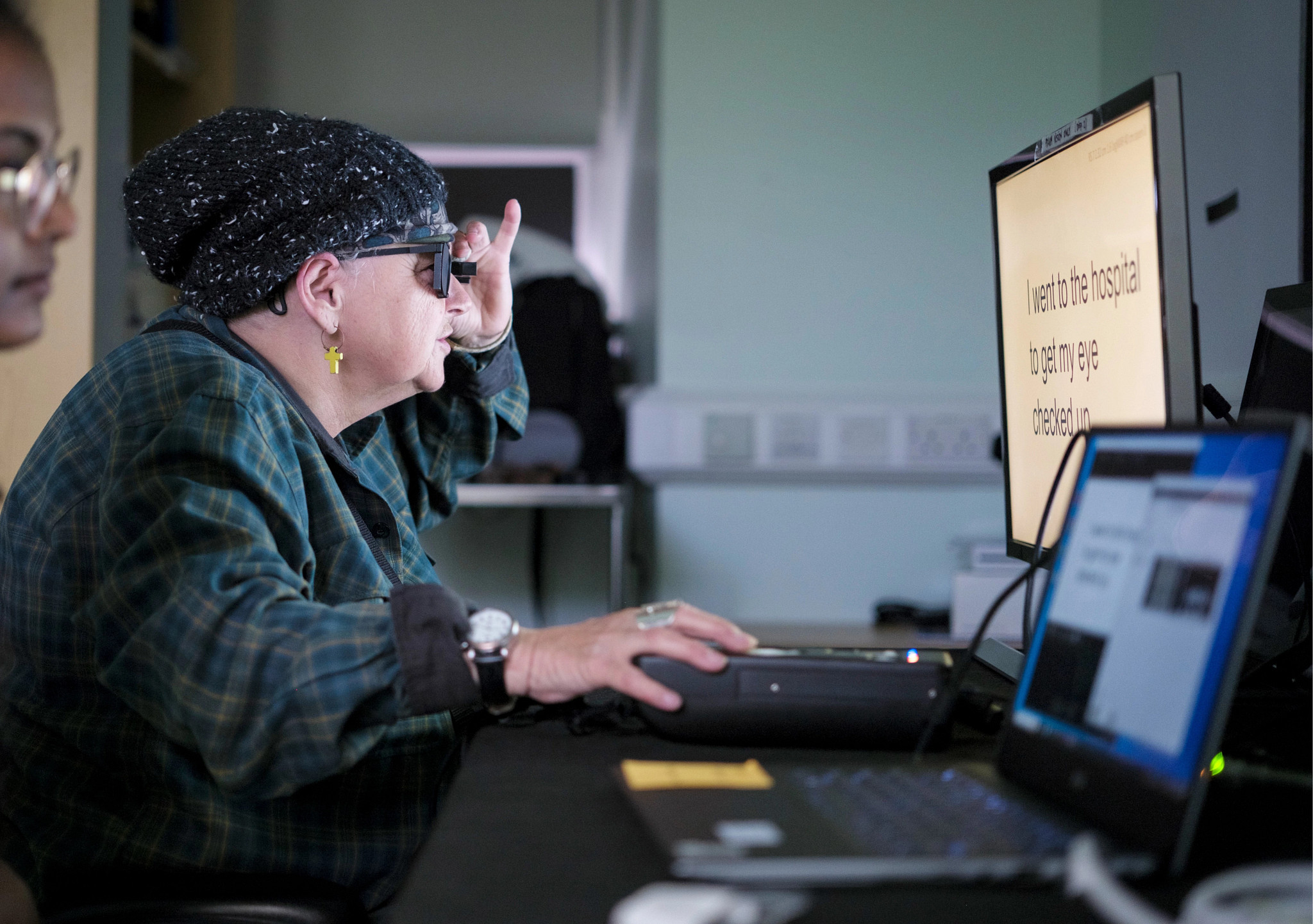 Sheila Irvine being trained to use, and read with, the PRIMA retinal implant