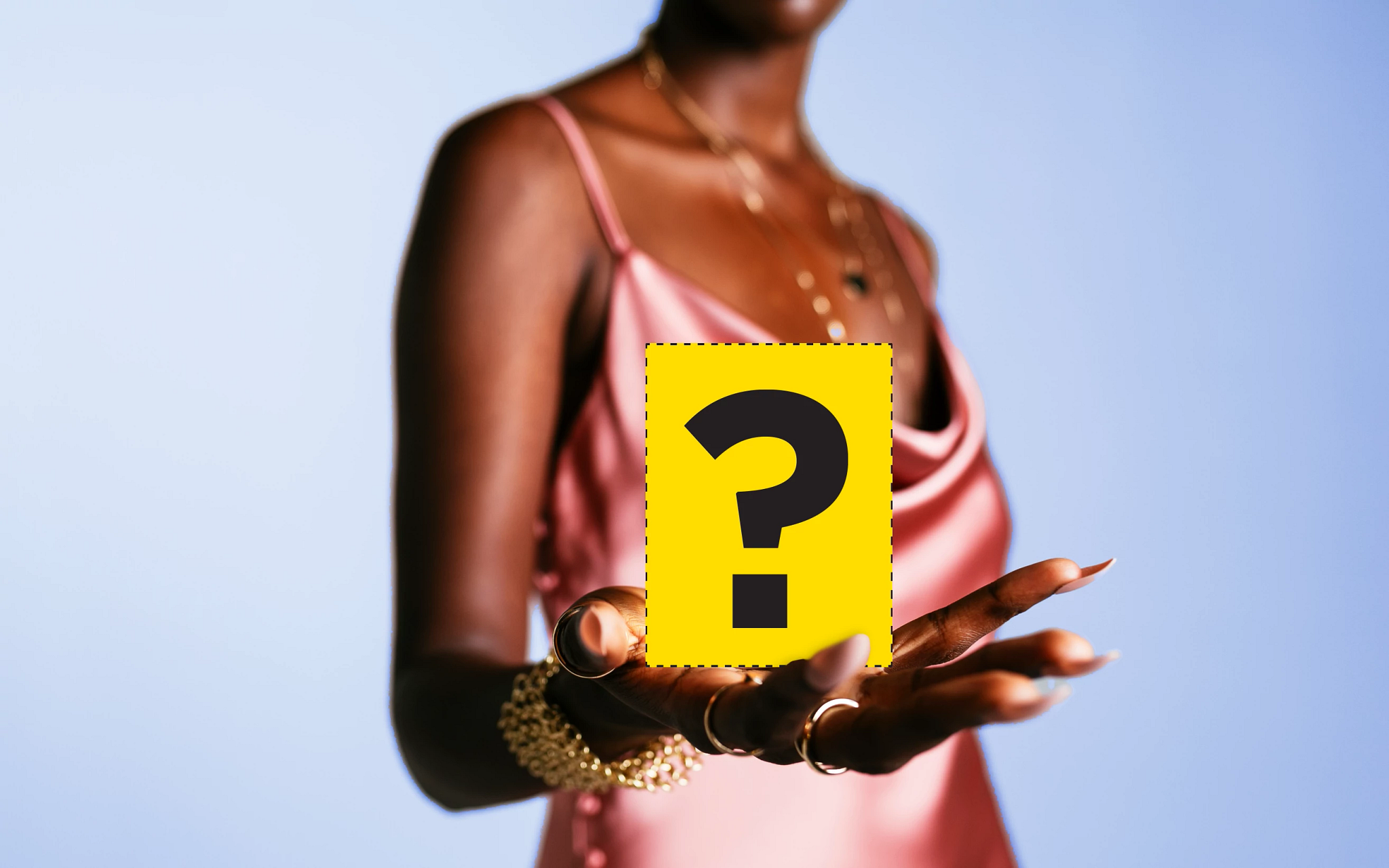 woman holding, perfume, hand out, yellow box
