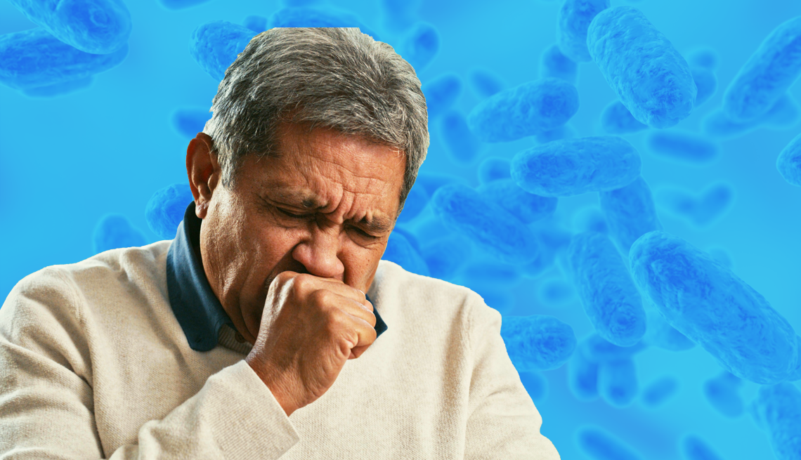 A Man Suffering from Whooping Cough a man suffering from whooping cough against an illustrative background of blue bacteria