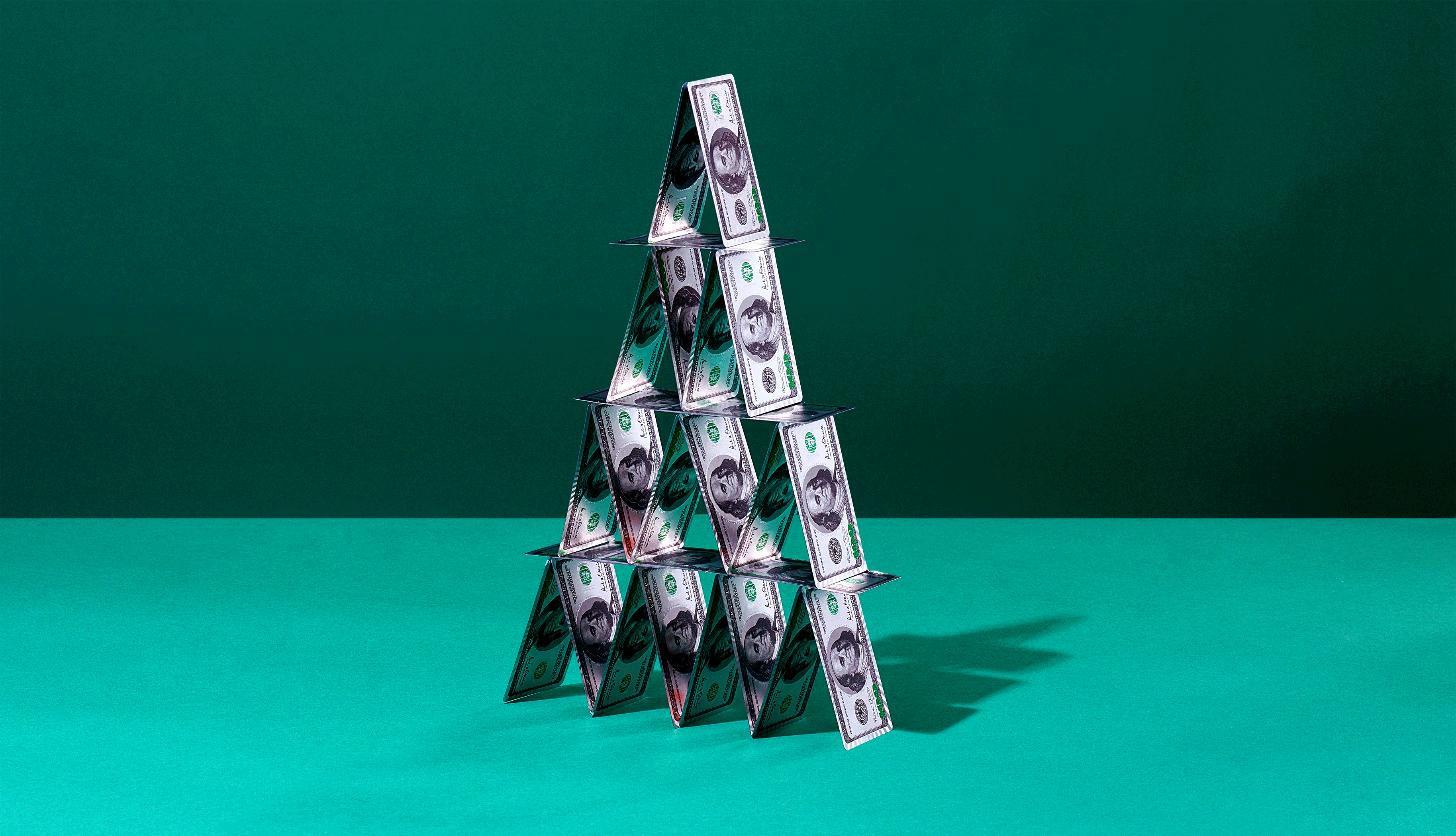 my biggest retirement mistake a house of cards colored to look like money falls apart