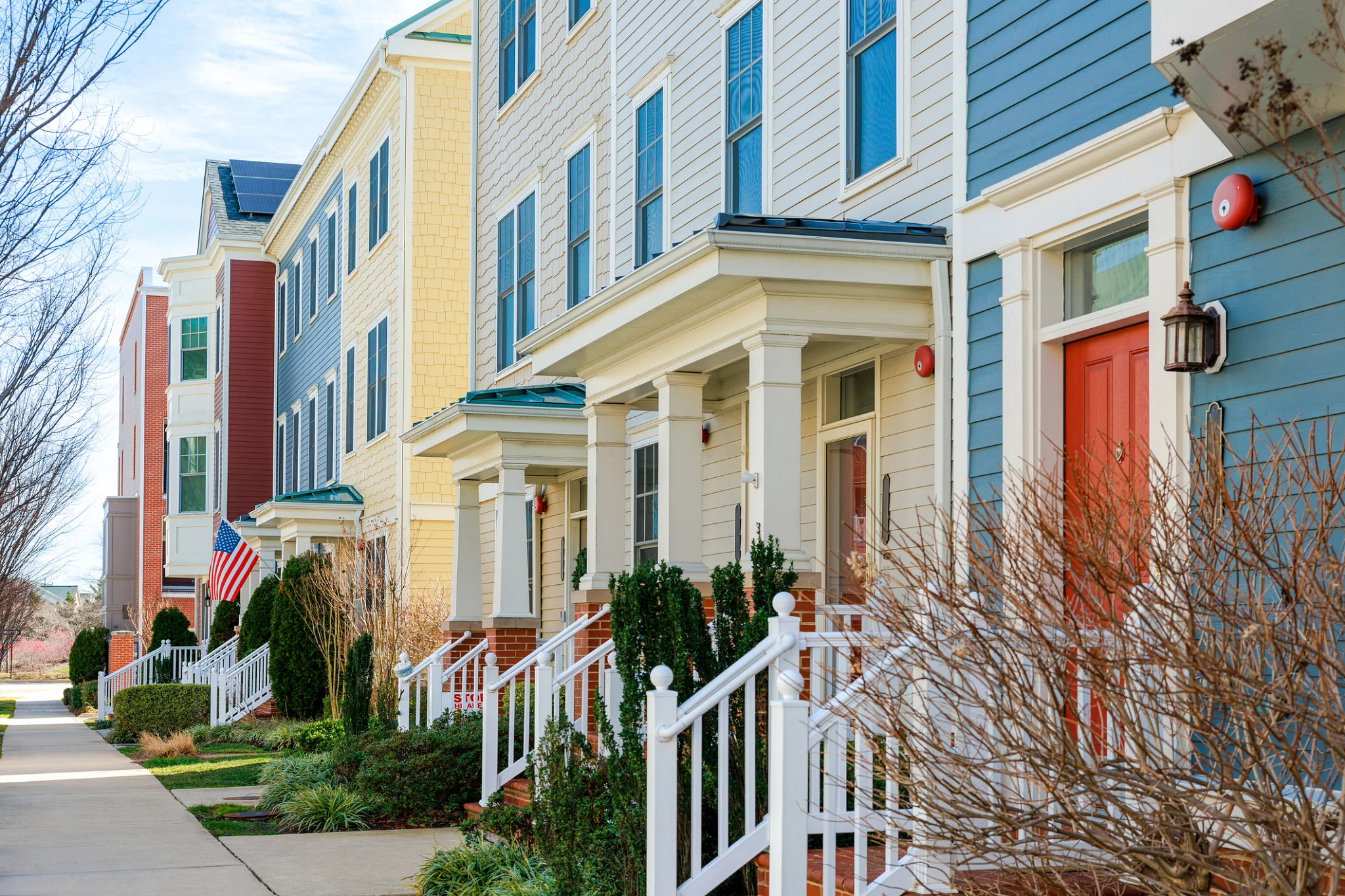 A row of colorful townhouses in residential district