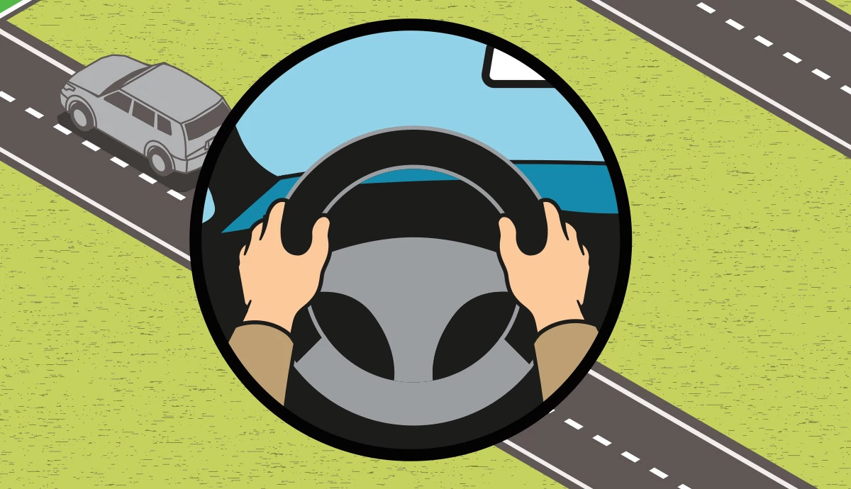 a graphic illustration shows a driver’s hands gripping a steering wheel with hands at 9 and 3 o clock