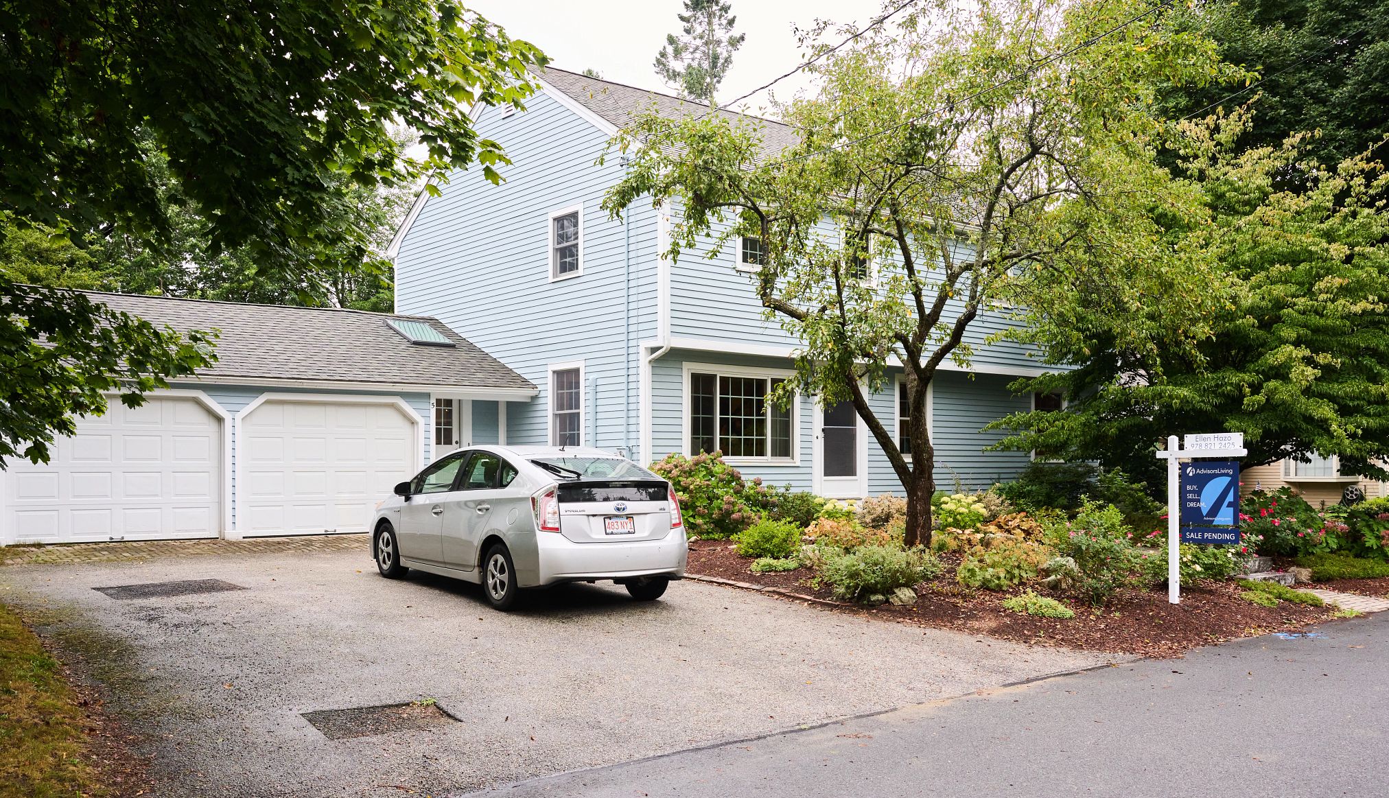 Can This Couple Find Familial Bliss Across the Country? a blue house that was for sale