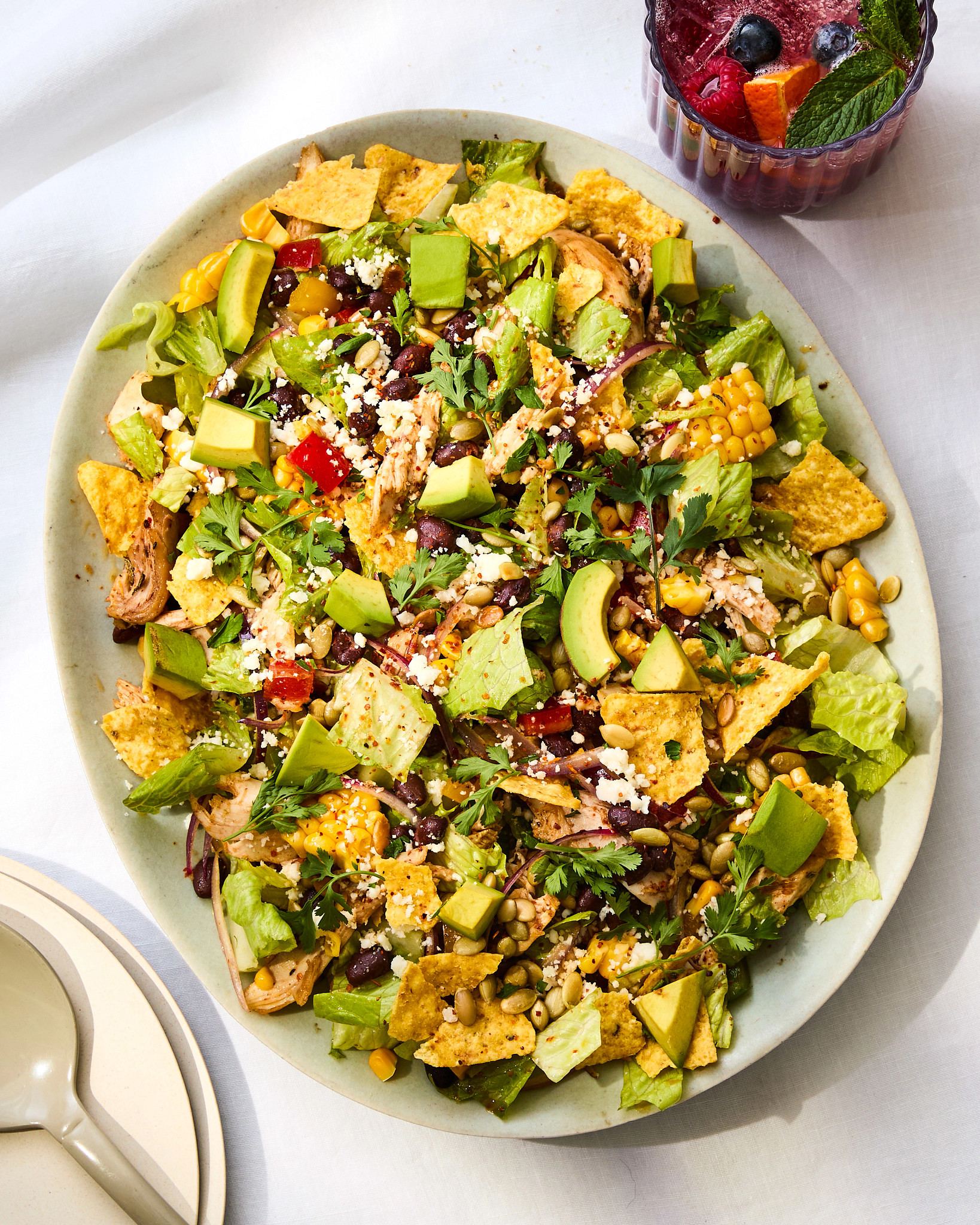 Spiced Chicken and Black Bean Taco Salad with Cilantro Lime Vinaigrette is shown