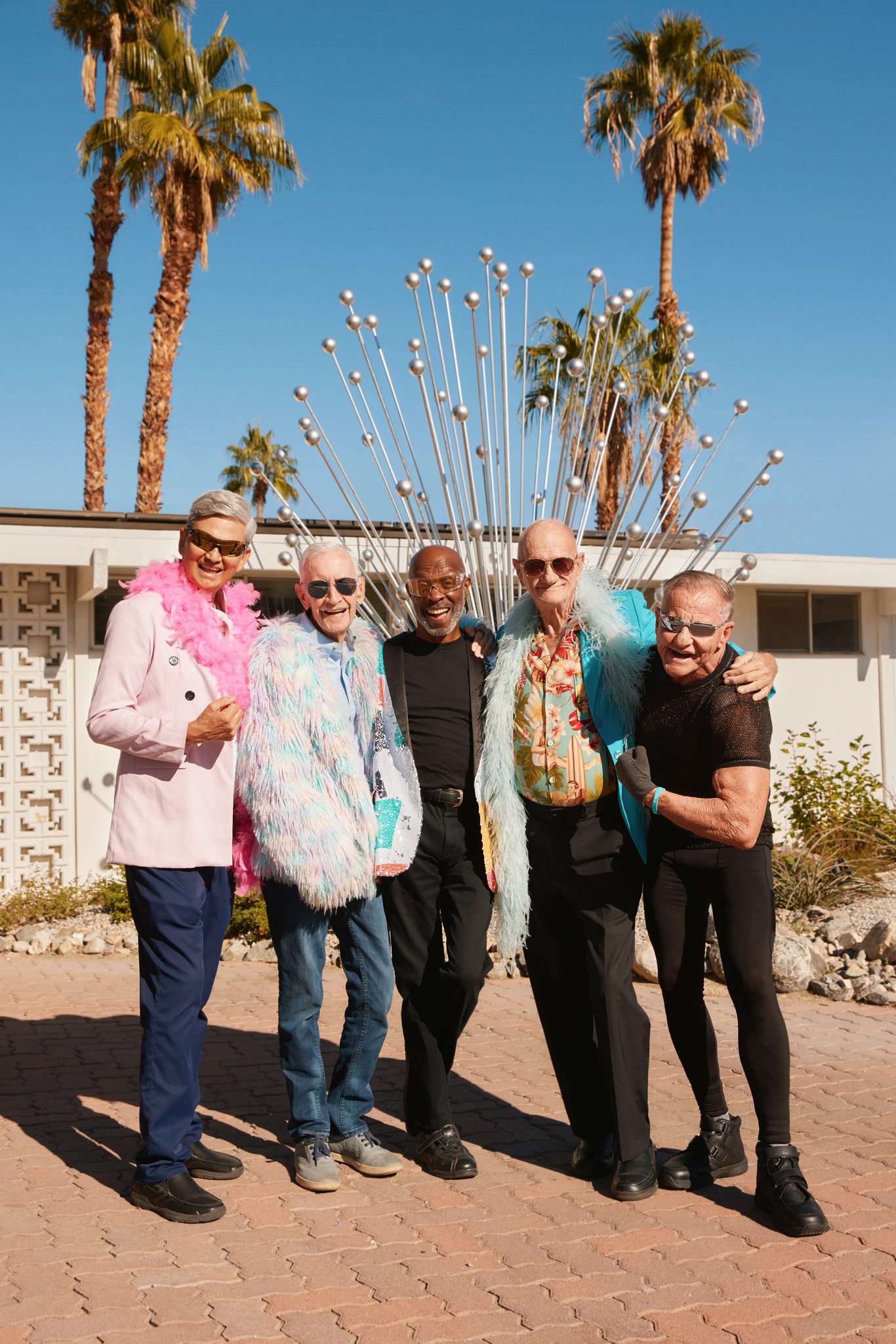 the members of the old gays are shown posing outside for a photo