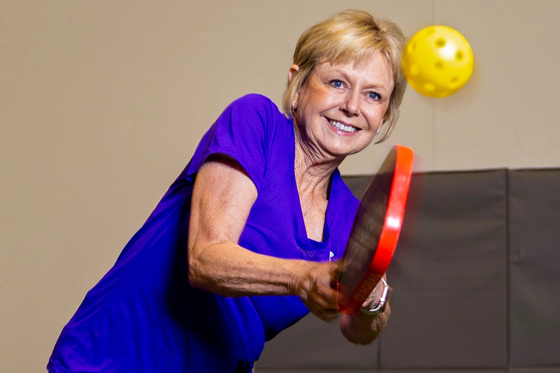 a person practicing pickleball
