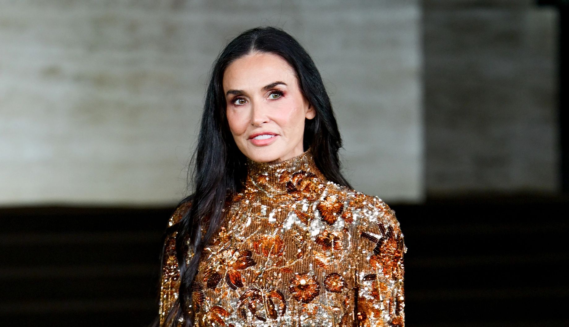 Demi Moore Calls Helen Mirren’s Work ‘Dynamic’ demi moore wearing an elaborately beaded golden gown