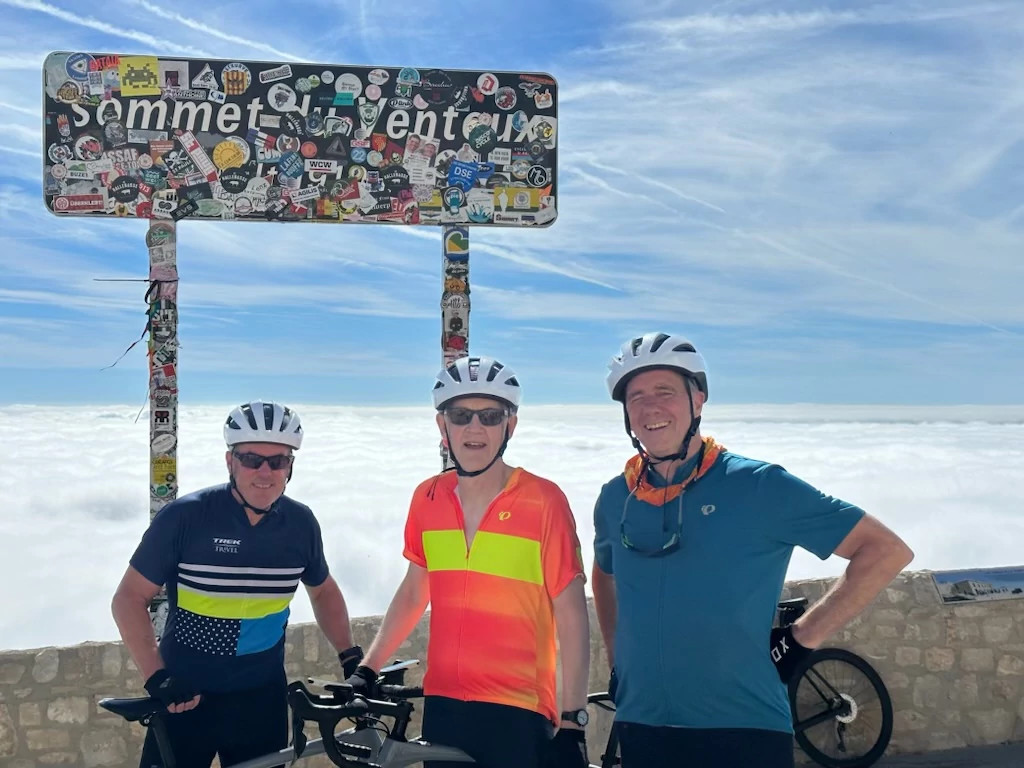 Marc Daudon, Blaine Harden and Chip Brown in front of Sommet du Ventoux sign