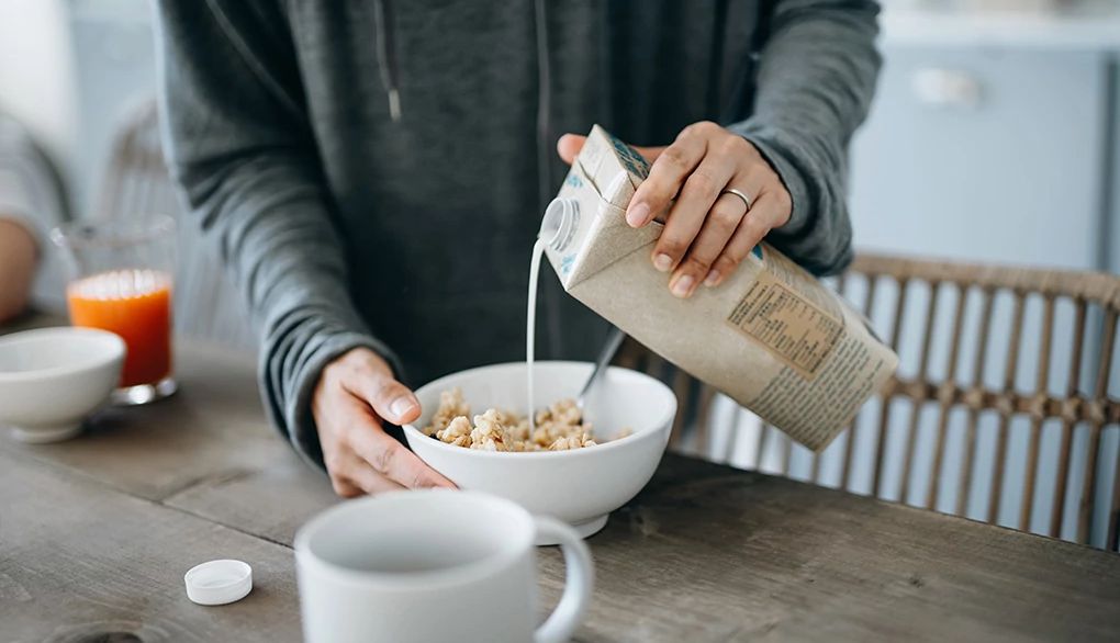 Nutritious alternatives exist for dairy products A person pouring milk into a cereal bowl