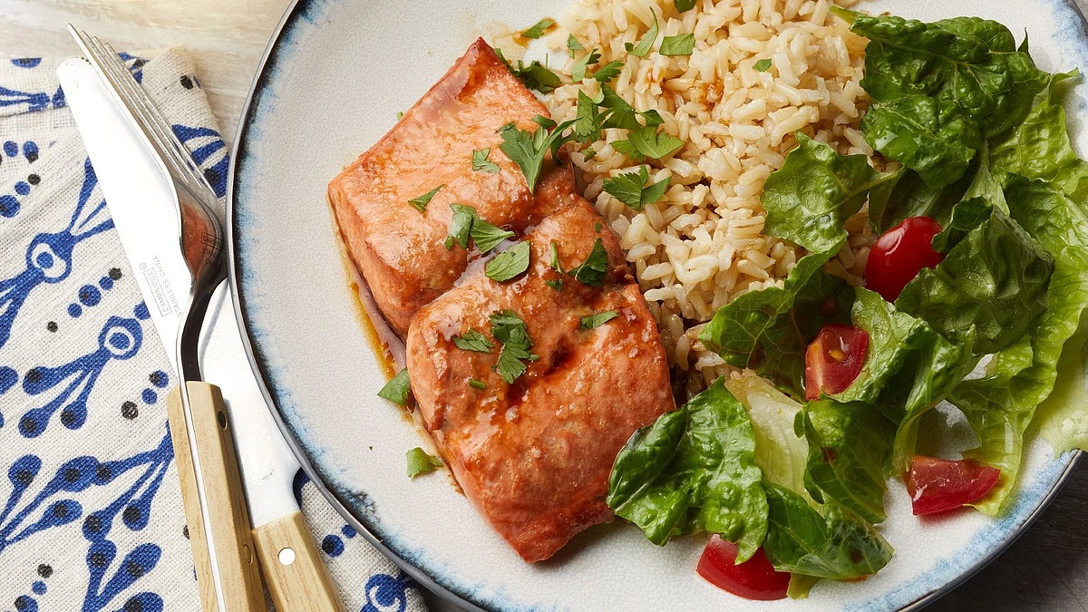 A close-up view of honey-garlic salmon on a plate