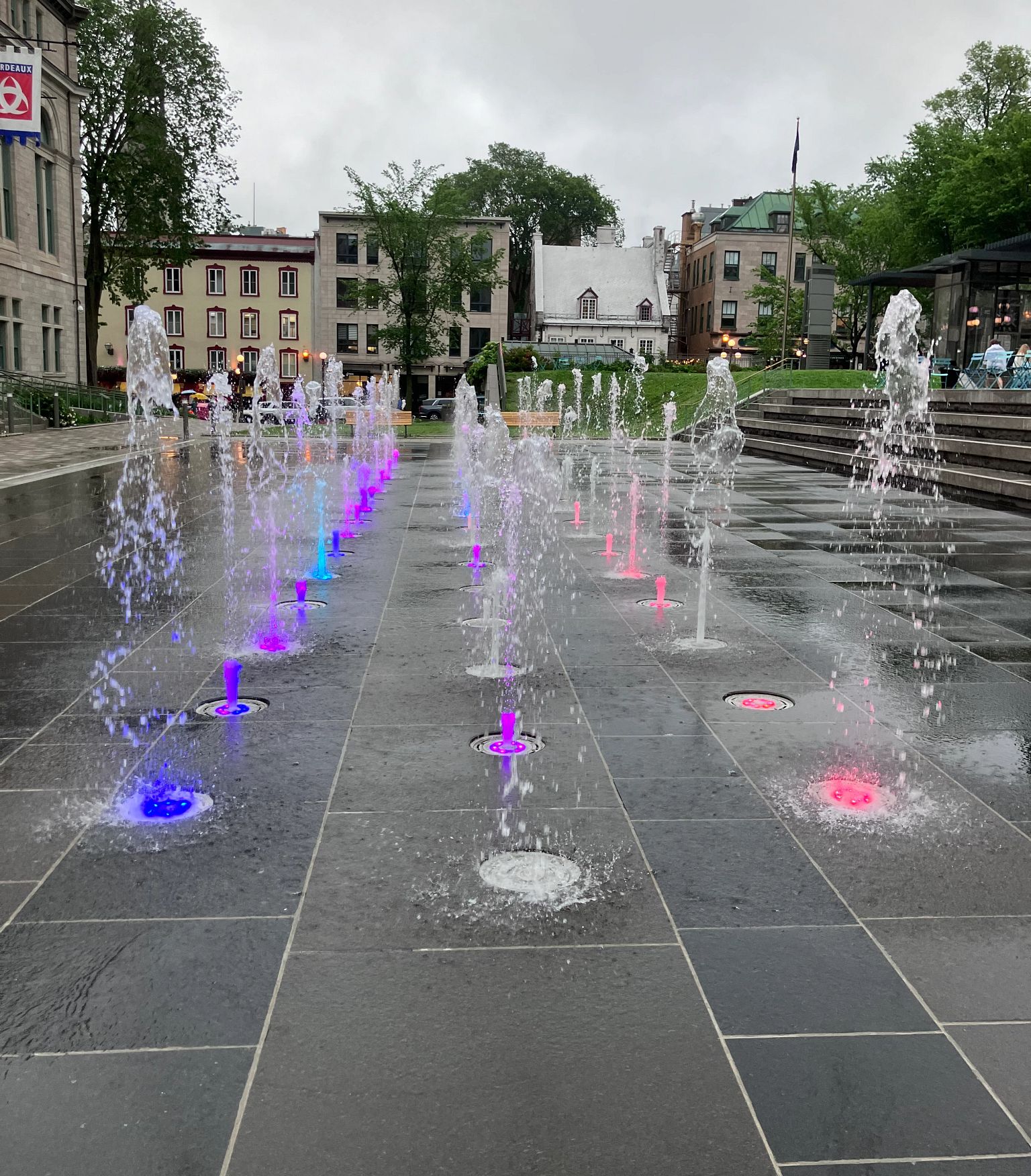 No Cash Overseas Lessons a fountain with multi colored lights