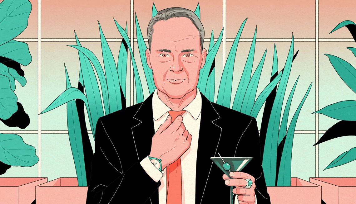 The Rise and Fall of a Ponzi Schemer a man wearing a suit with a martini in his hand