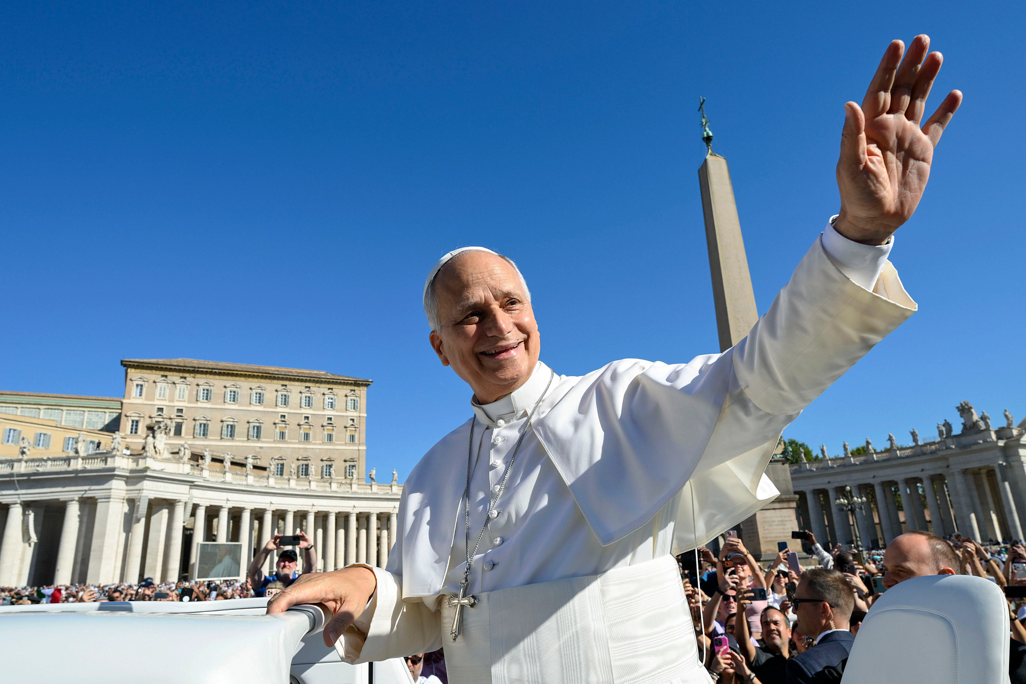Pope Leo XIV waving at the Vatican.