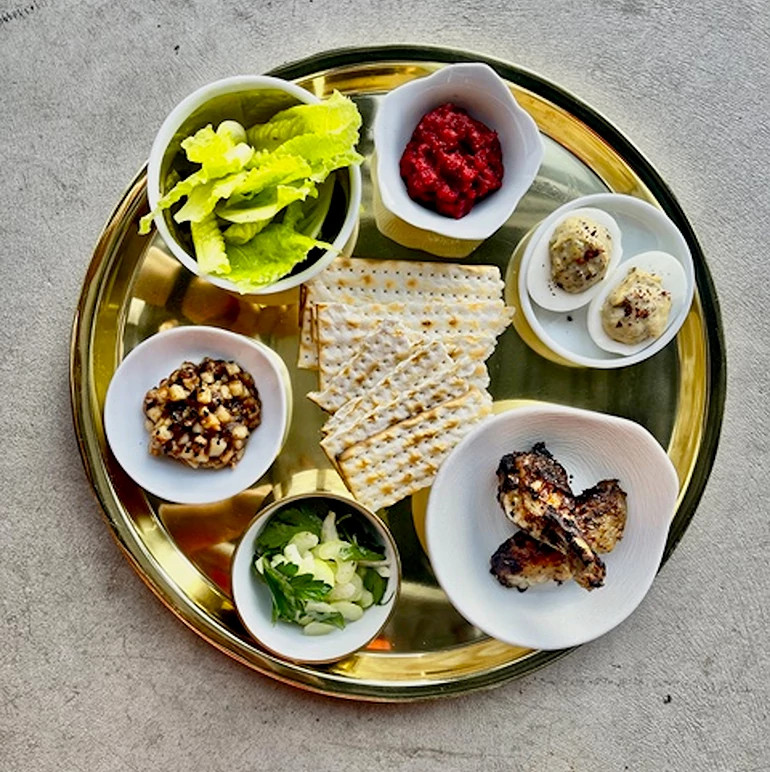 an example of a seder plate seder plate featuring chicken wings
