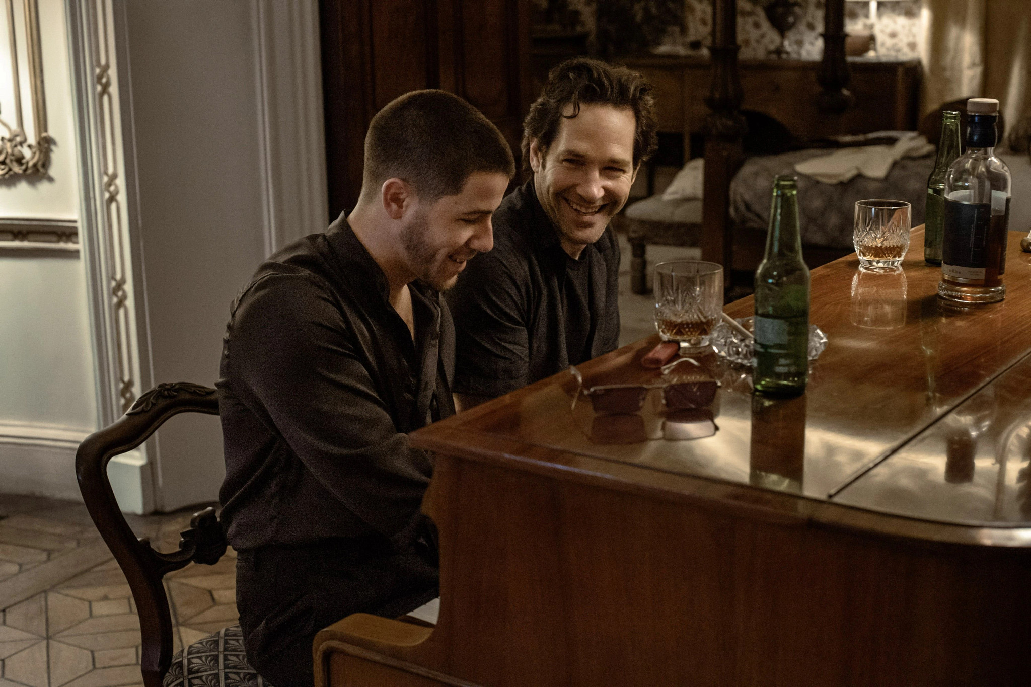 nick jonas and paul rudd in a scene from the movie power ballad