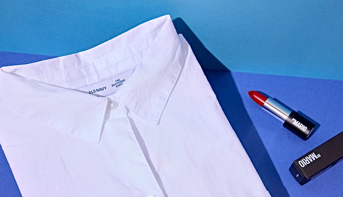 a collage with a white collared shirt and a tube of red lipstick