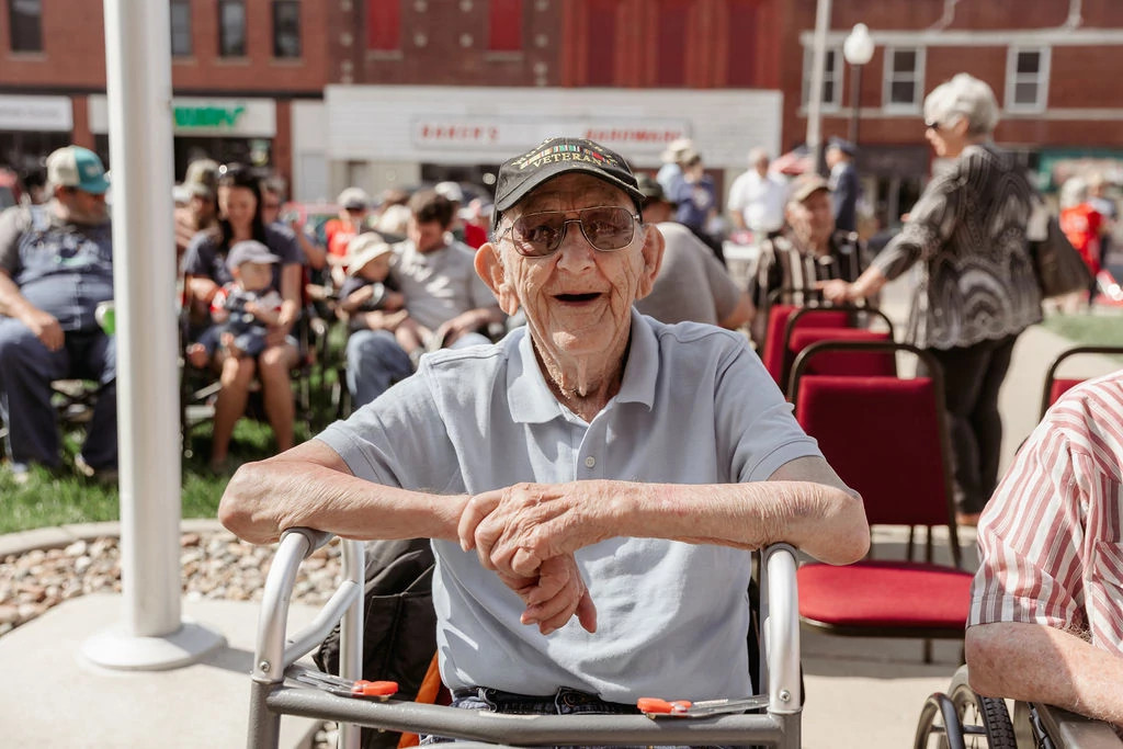 john swartz smiling at a memorial day event in his hometown